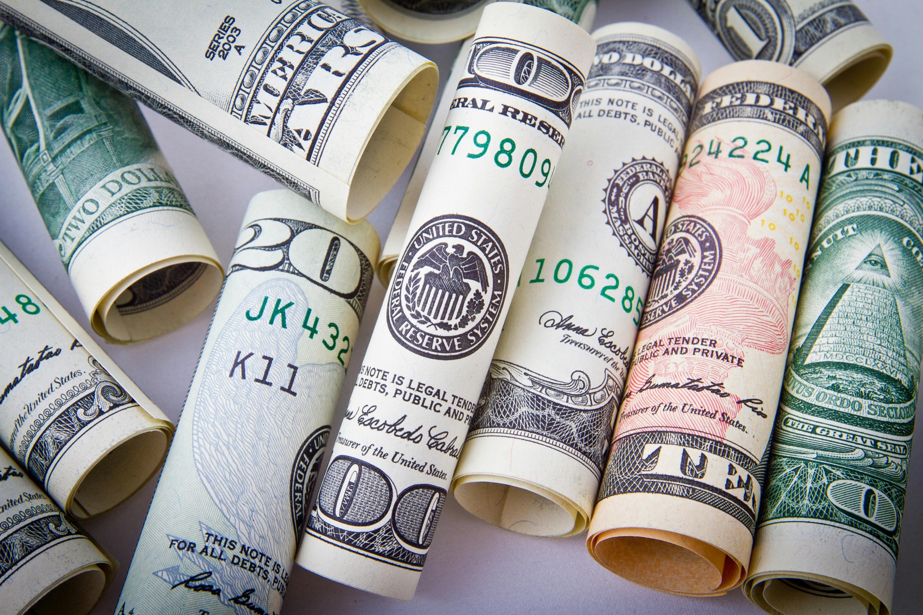 Rolled dollar notes representing capital markets